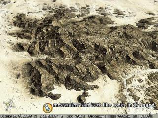 mountains that look like rocks in the sand