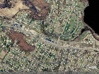 42 25 36 N 071 11 45 W
